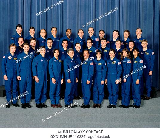 Thirty-one 1998 astronaut candidates, including six international mission specialist trainees, pose for a class picture. Front row, left to right: Bjarni V