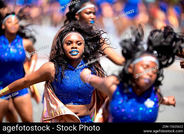 Chicago, Illinois, USA - August 8, 2019: The Bud Billiken Parade, Dancer team performing at the parade on Martin Luther King street