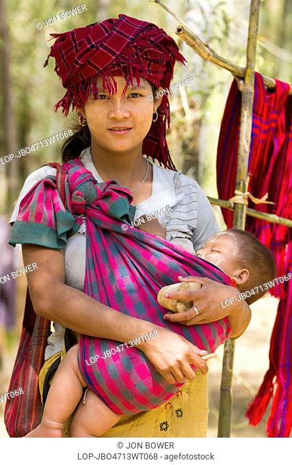Myanmar, Shan, Shwe Inn Thein. A mother and child in Inn Thein Village in Myanmar