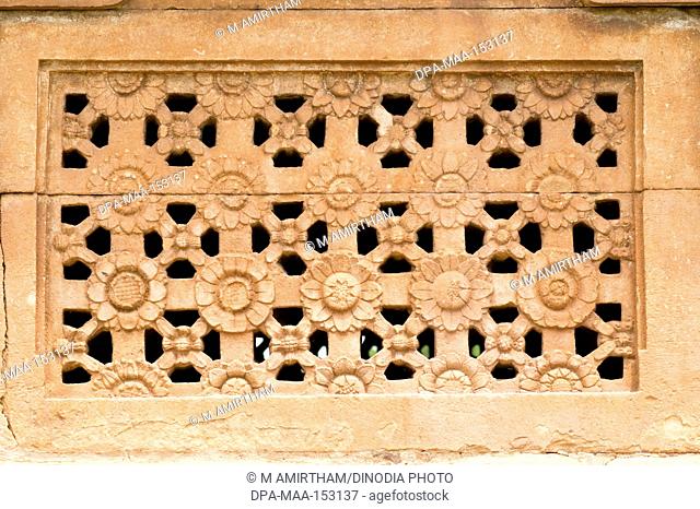 Carved stone windows in Ladkhan temple built in 7th century ; Aihole ; Karnataka ; India