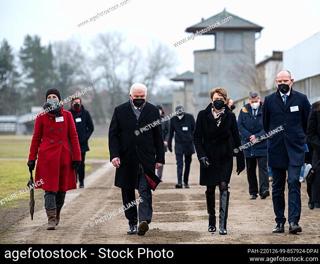 26 January 2022, Brandenburg, Oranienburg: German President Frank-Walter Steinmeier (2nd from left) and his wife Elke Büdenbender are guided through the...