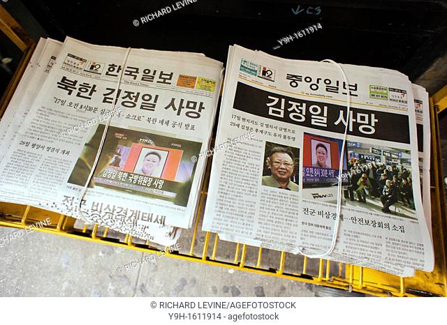 The New York newspapers, Korea Times and Korea Daily are seen in Koreatown in New York on Monday, December 19, 2011 with headlines reporting on the death of...
