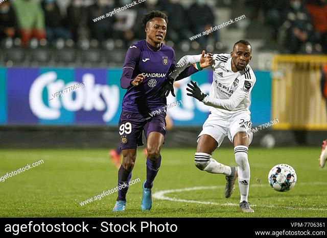 Anderlecht's Christian Kouame and Eupen's Silas Gnaka fight for the ball during a soccer game between KAS Eupen and RSC Anderlecht