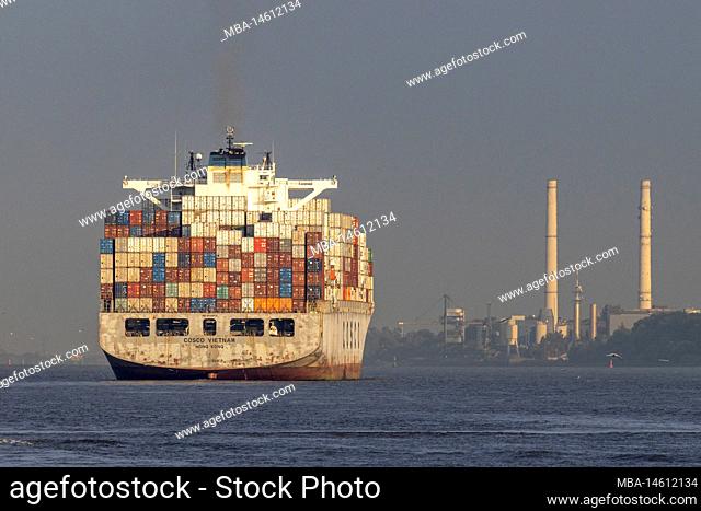 The container ship Cosco Vietnam leaving the port of Hamburg