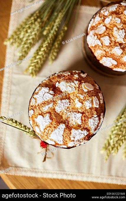 Easter cake with rustic decoration, wheat on wooden table the holiday, Happy Easter Holiday