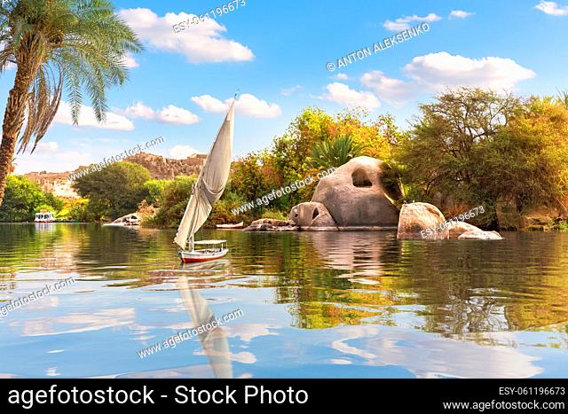 The Nile and traditional African sailboats near Aswan, Egypt