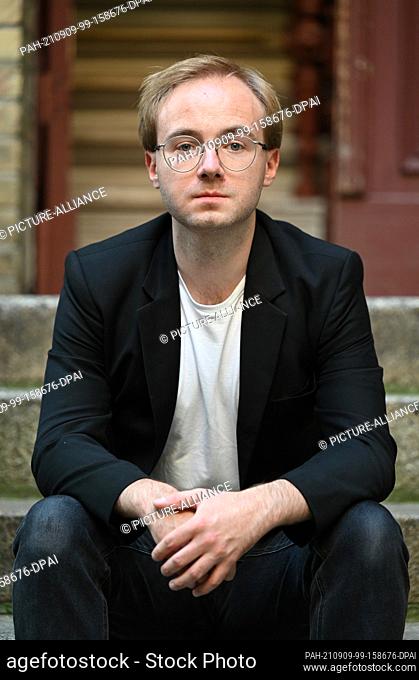 08 September 2021, Berlin: Bassist David Specht, member of the music band ""Isolation Berlin"", photographed in a backyard in the Prenzlauer Berg district