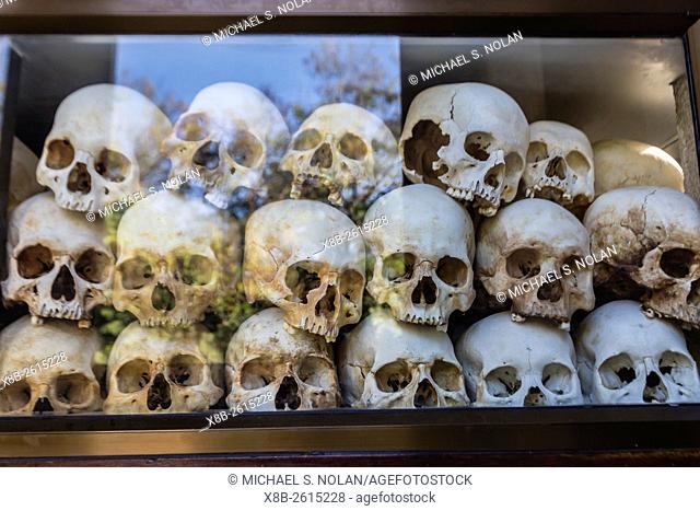 Human skulls on display, Killing Fields Monument of Choueng Ek, Phnom Penh, Cambodia