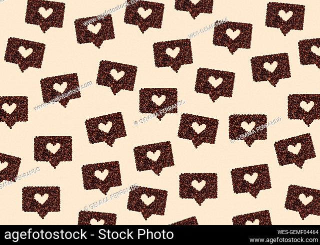Pattern or roasted coffee beans arranged into shapes of hearts inside online chat bubbles