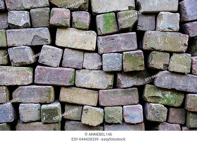Loose brick wall horizontal background texture grey old