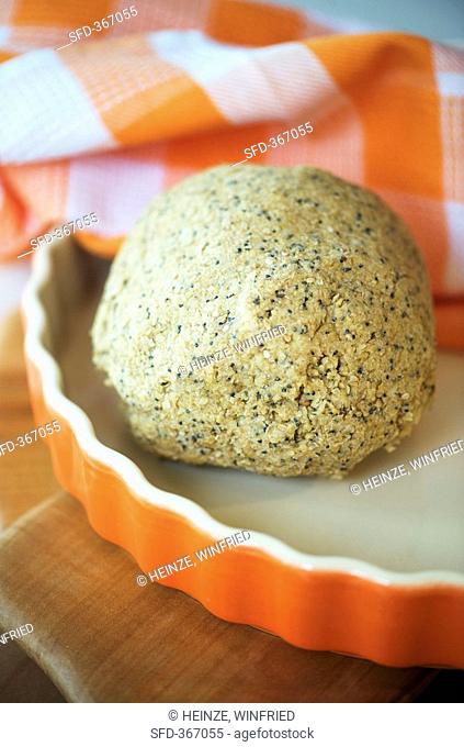 Ball of oatmeal and seed dough for oatcakes