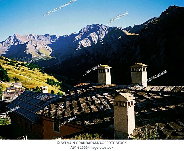 Village of Saint-Véran, the highest in France. Traditional roofs made of flat stones, Lauze. Queyras massif. Hautes-Alpes. France