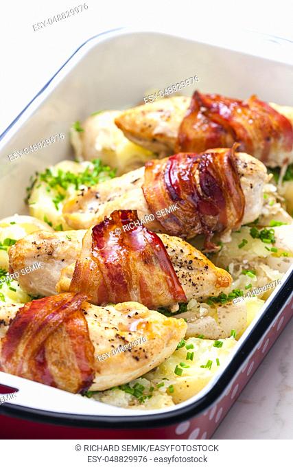 still life of poultry roulade with bacon