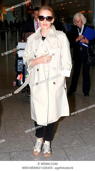 Kylie Minogue arrives at Heathrow airport after her appearance on the Italian version of The Voice Featuring: Kylie Minogue Where: London