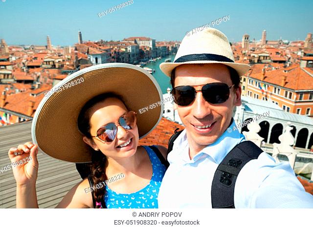 Couple Taking Selfie Near Rialto Bridge, Venice, Italy