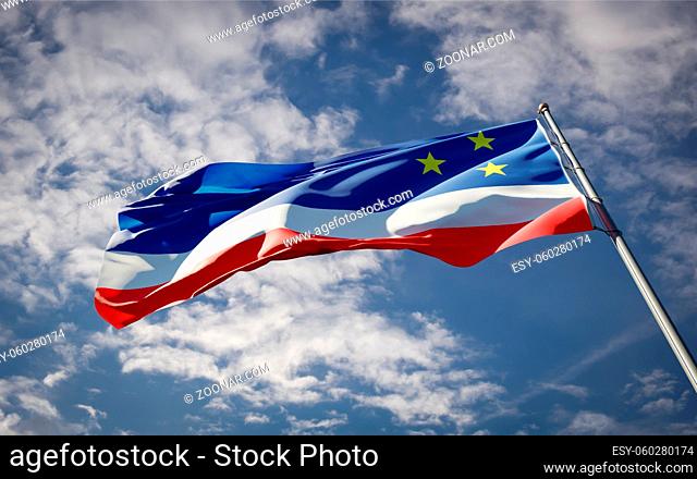 Beautiful national state flag of Gagauzia fluttering at sky background. Low angle close-up Gagauzia flag 3D artwork
