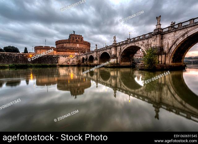 Castle of Holy Angel and Holy Angel Bridge over the Tiber River in Rome at Dawn, Italy - HDR version