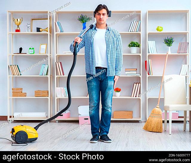 The man doing cleaning at home
