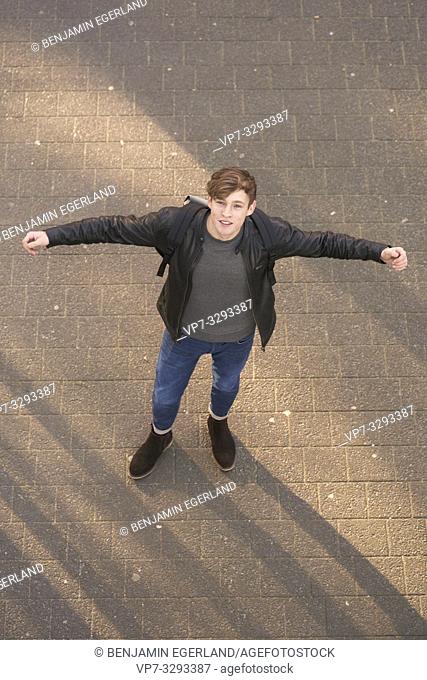 young man seen from above, in Hamburg, Germany
