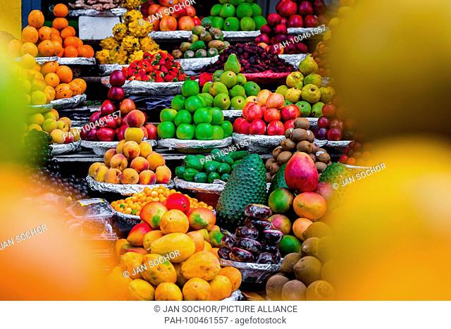 Piles of fruits (apples, peaches, mangos, papayas, guanabanas, pears etc.) are seen arranged at the fruit market of Paloquemao in Bogota, Colombia