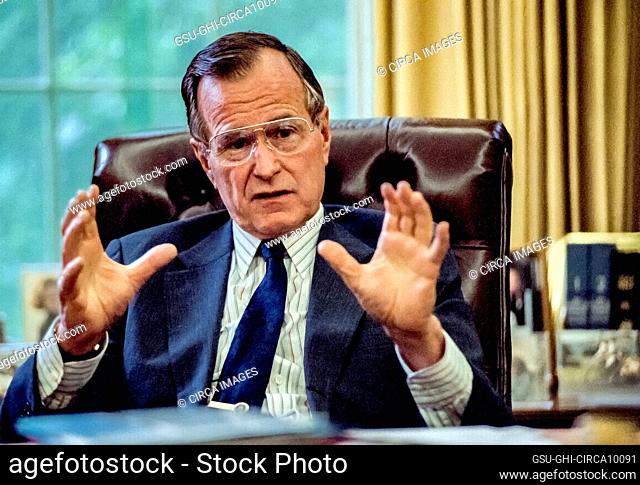 U.S. President George H.W. Bush at his Oval Office desk, White House, Washington, D.C., USA, Michael Geissinger, 1989