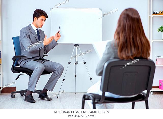 Business presentation in the office with man and woman