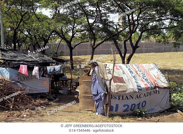 Nicaragua, Managua, Avenida Simon Bolivar, protest, squatters, cardboard house, huts, shacks, corporate social responsibility, Grupo Pellas, sugar producer