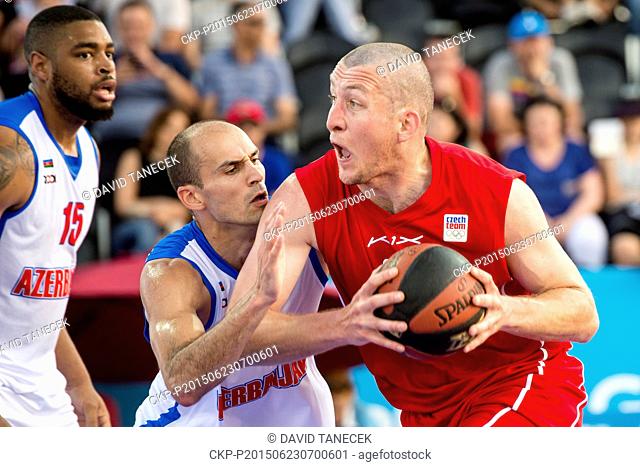 From left: Marshall Moses and Rolandas Alijevas of Azerbaijan and Jan Tomanec of Czech Republic in action during the Men's 3x3 Basketball match Azerbaijan vs...