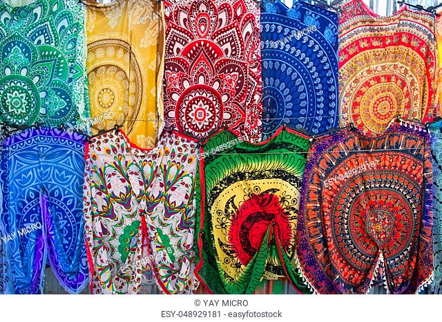 Bright colourful multicolored Middle Eastern, Arabian, Turkish, mediterranean oriental traditional babushka shawls, rugs and kerchiefs