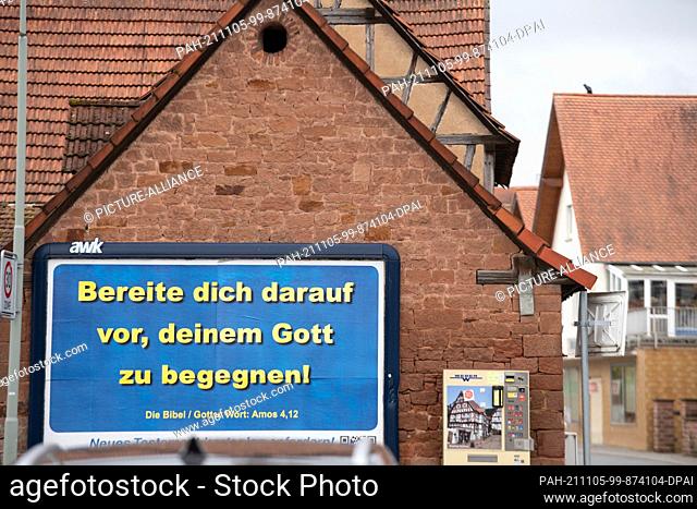 02 November 2021, Hessen, Vonhausen: ""Prepare to meet your God"" is written on a billboard in Vonhausen. A few hundred yards away