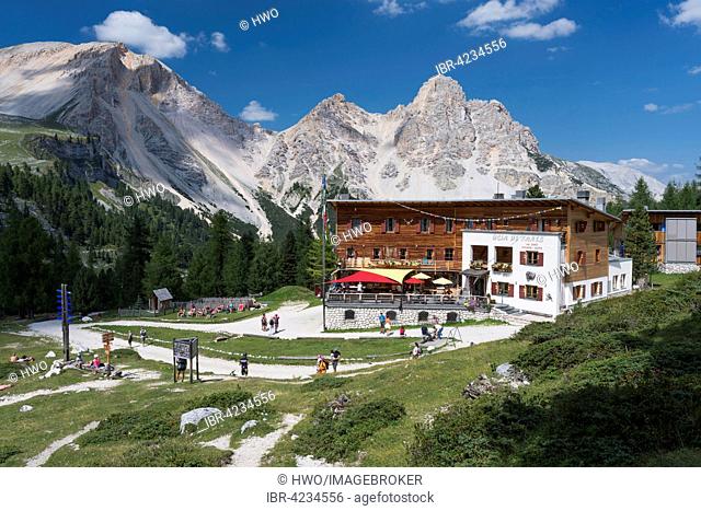 Tourists at Fanes Hut, Kleine Fanesalm, Fanes group, Fanes-Sennes-Prags Nature Park, Dolomites, South Tyrol Province, Trentino-Alto Adige, Italy