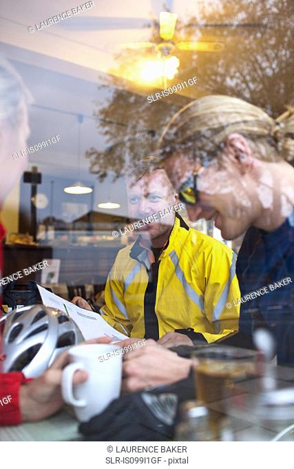 Cyclists meeting in cafe