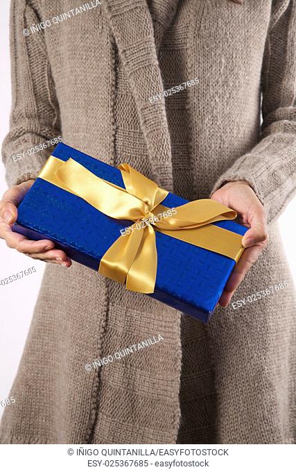 woman detail with a gift box in her hands