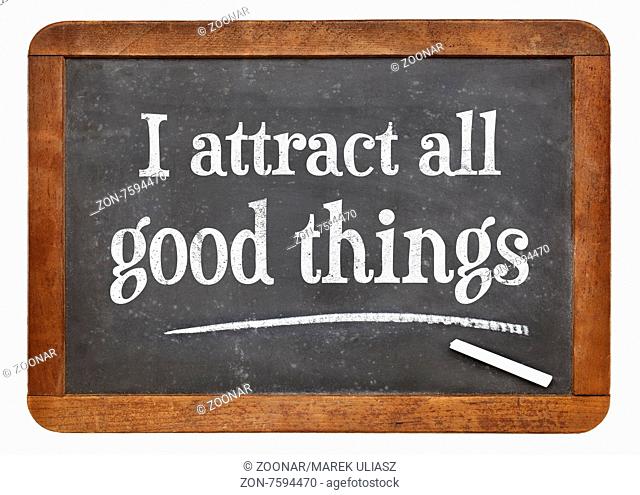 I attract all good things - positive affirmation words on a vintage slate blackboard