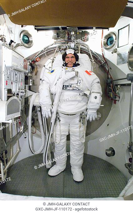 Astronaut Dafydd R. (Dave) Williams, STS-118 mission specialist representing the Canadian Space Agency, participates in an Extravehicular Mobility Unit (EMU)...