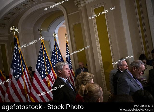 United States Senator Sheldon Whitehouse (Democrat of Rhode Island), left, listens while United States Senate Majority Leader Chuck Schumer (Democrat of New...