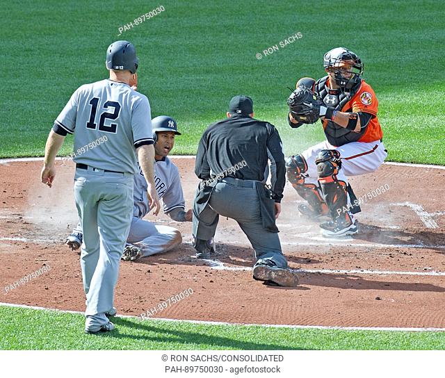 New York Yankees right fielder Aaron Hicks (31) scores the second running the second inning against the Baltimore Orioles at Oriole Park at Camden Yards in...