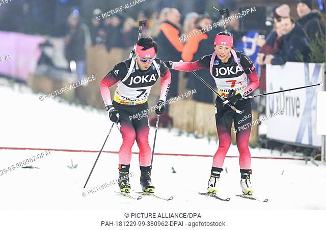 29 December 2018, North Rhine-Westphalia, Gelsenkirchen: Japanese biathletes Mikito Tachizaki (l-r) and Fuyuko Tachizaki will run at the 17th Biathlon World...