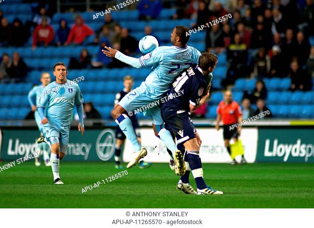 17 04 2012 Coventry, England Coventry City v Millwall Clive Platt Coventry City and Shane Lowry Milwall in action during the NPower Championship game played at...