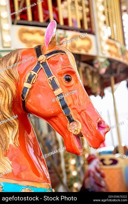 Colorful wooden horse of a children circus carousel