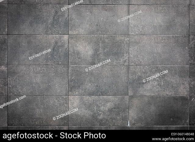 Modern grey stone wall outside texture background