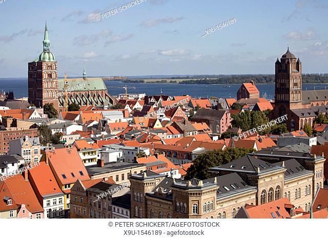 view over the historic centre of Stralsund with Saint James's Church, St  Nicolas's church and Ruegen island, Hanseatic City of Stralsund