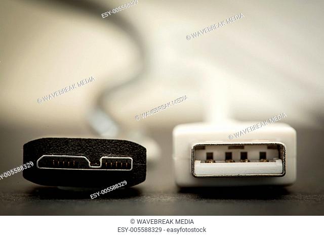 Close up of tip of black USB SS and white USB