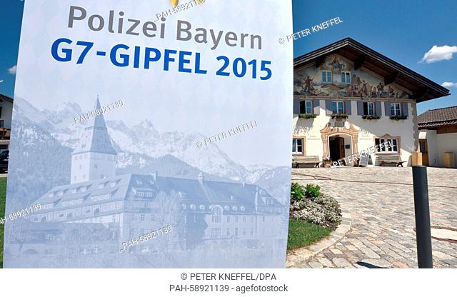 A stand-up display written with 'Bavarian Police - G7 Summit 2015' can be seen in front of town hall in Kruen, Germany, 04 June 2015