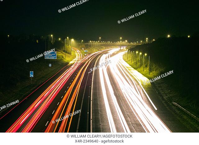 Traffic trails on the M6 Dublin to Galway motorway at the Tyrellspass Junction, County Westmeath, Ireland