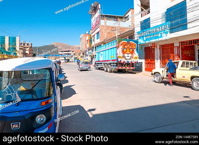 Sicuani Peru August 17 vehicle parked along a street in the center of Sicuani known for its church of bright colors. Shoot on August 17, 2019