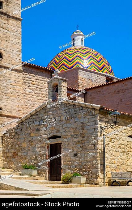 Olbia, Sardinia / Italy - 2019/07/21: XVIII century St. Paul Apostle Church - Chiesa di San Paolo Apostolo - and St. Cross oratory - Oratorio di Santa Croce -...