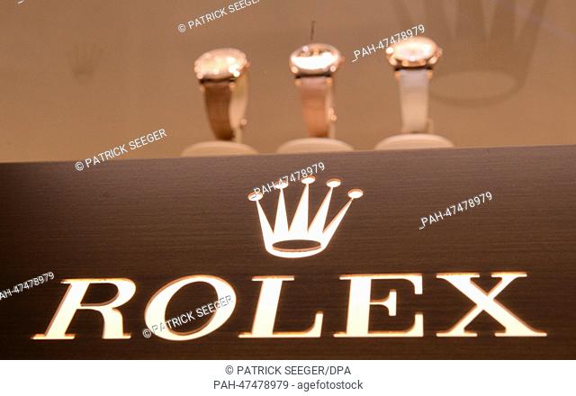The logo of watch manufacturer Rolex is on display at the International watch and jewellery fair Baselworld 2014 in Basel,  Switzerland, 28 March 2014