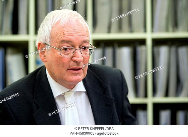 Presiding judge Joachim Eckert stands in the courtroom in the regional court in Munich, Germany, 27 January 2014. Former managers of the BayernLB are accused of...