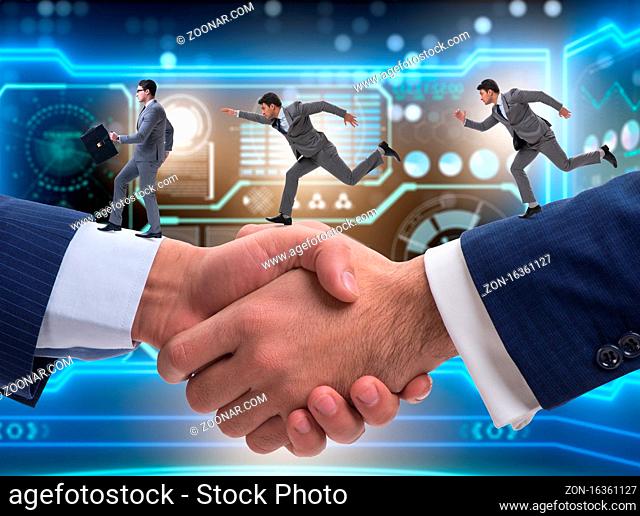The cooperation concept with people running on handshake